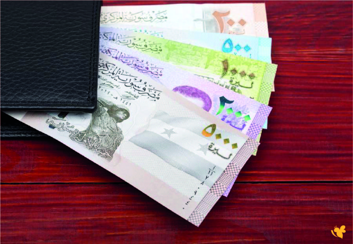 الليرة السورية تصعد امام الدولار بعد رفع العقوبات شاهد اليوم الجمعة 12 ديسمبر كم بلغ سعرة؟